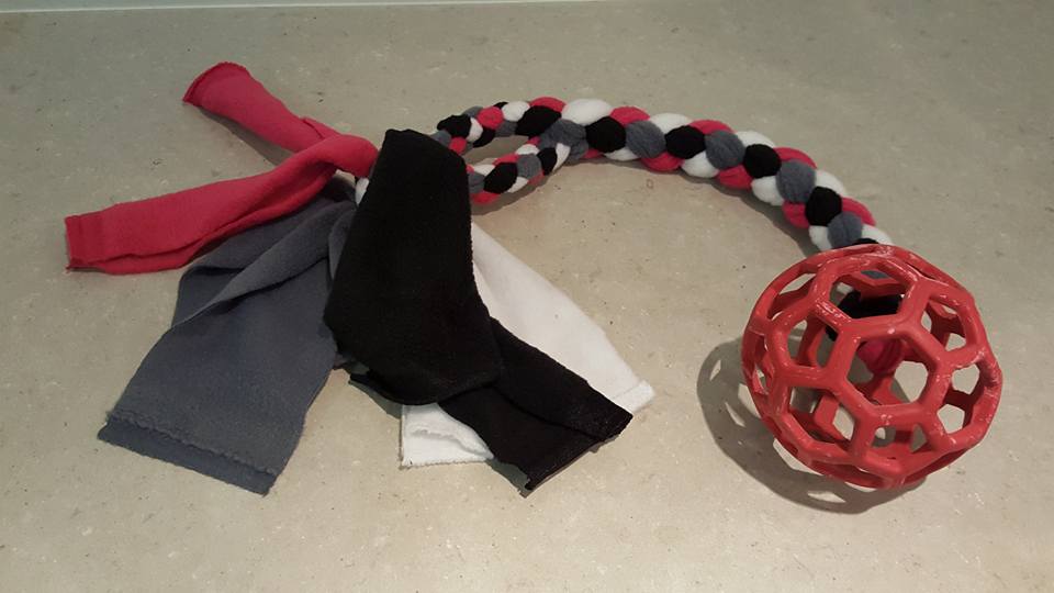HoleeRollerTug Hol-ee roller tug toy